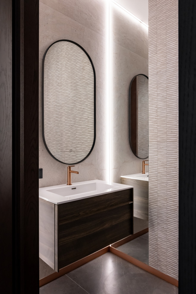 Small contemporary cloakroom in Moscow with raised-panel cabinets, dark wood cabinets, a wall mounted toilet, beige tiles, ceramic tiles, beige walls, porcelain flooring, a console sink, solid surface worktops, grey floors, white worktops and a floating vanity unit.