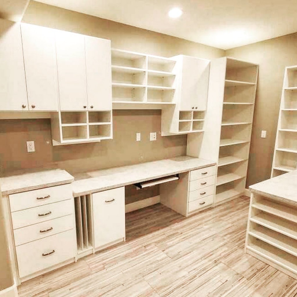 Large Craft Room - This large basement space was dreamed up by the homeowner to allow her to do many crafts with her grandkids! This was a really fun project to do - every craft has it's own placement in the room.