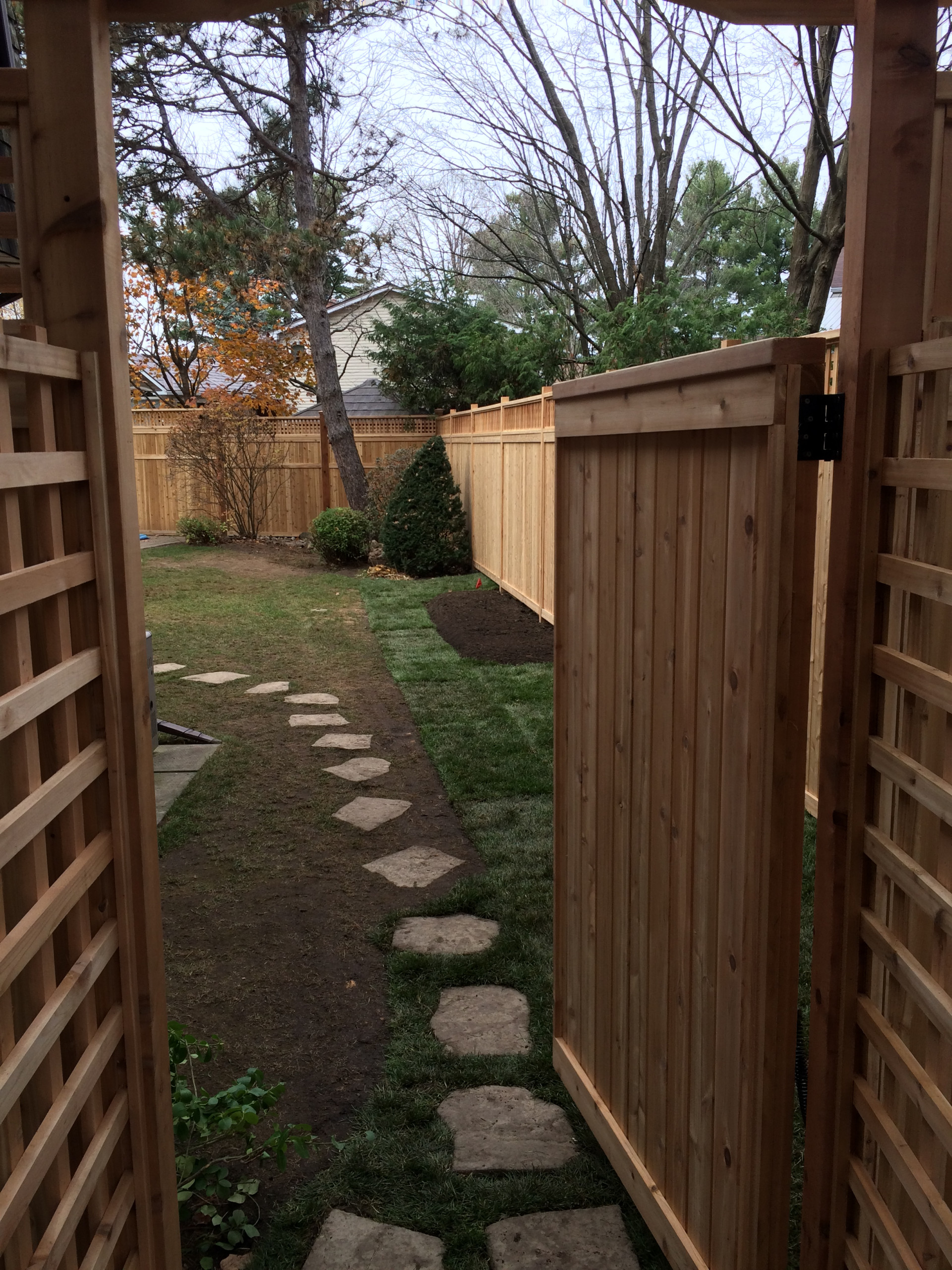 toungue & groove Cedar fence with 6 x 6 posts & 4 x 4 posts