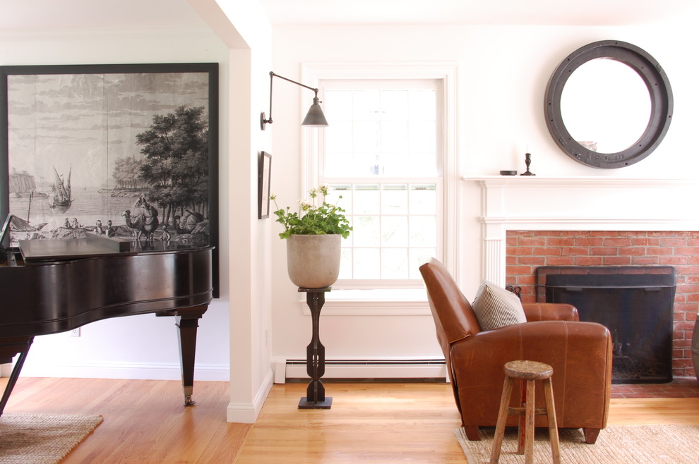 Design ideas for a transitional living room in Boston with a brick fireplace surround and white walls.