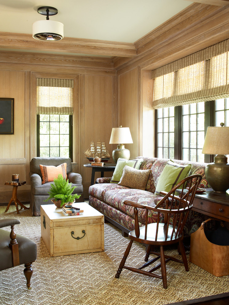 Inspiration for a large timeless enclosed dark wood floor family room remodel in New York with brown walls