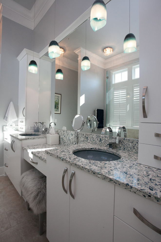 Mid-sized contemporary master bathroom in Charleston with a drop-in sink, flat-panel cabinets, white cabinets, recycled glass benchtops, an open shower, beige tile, ceramic tile, grey walls, porcelain floors and beige floor.
