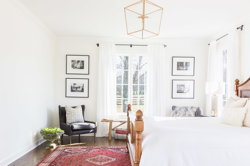 Inspiration for a transitional bedroom in Nashville with white walls and dark hardwood floors.
