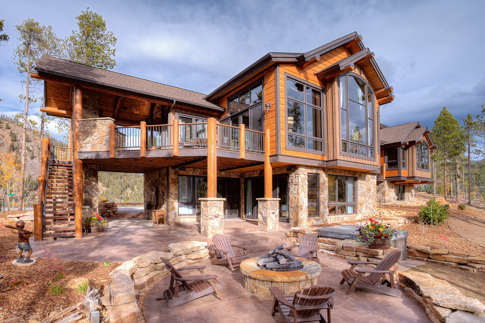 Photo of a country exterior in Denver with stone veneer.