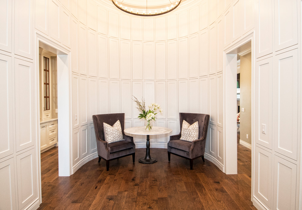 Mid-sized transitional dark wood floor and brown floor vestibule photo in Austin with white walls and a metal front door