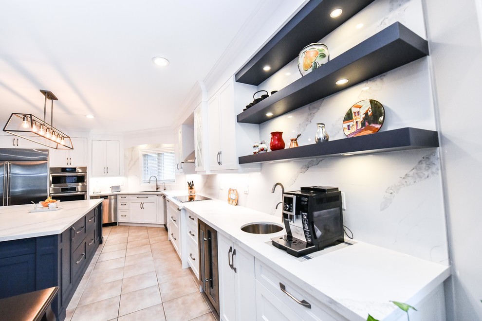 Example of a transitional kitchen design in Toronto
