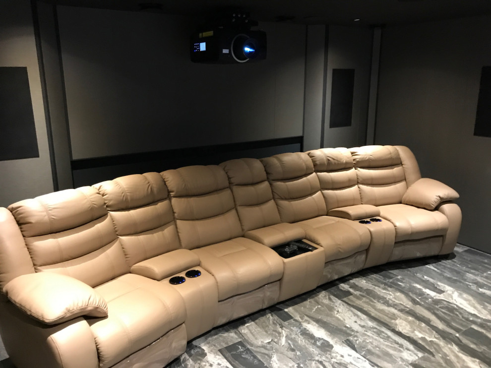 Design ideas for a mid-sized contemporary enclosed home theatre in Moscow with grey walls, a projector screen and grey floor.