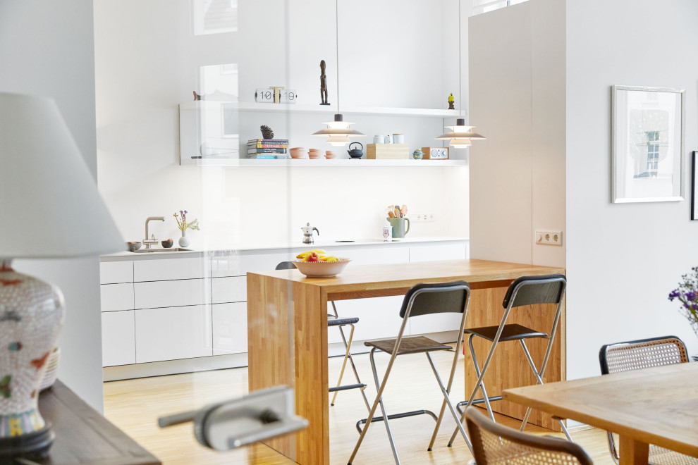 This is an example of a contemporary kitchen in Hanover with white benchtop.
