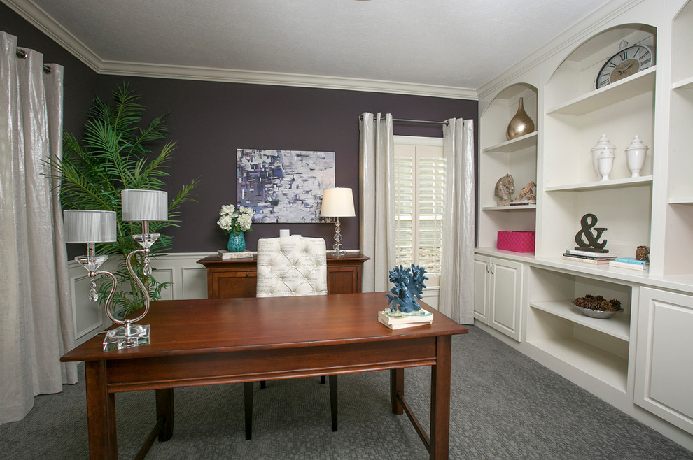 Home office - transitional freestanding desk carpeted and gray floor home office idea in Columbus with purple walls