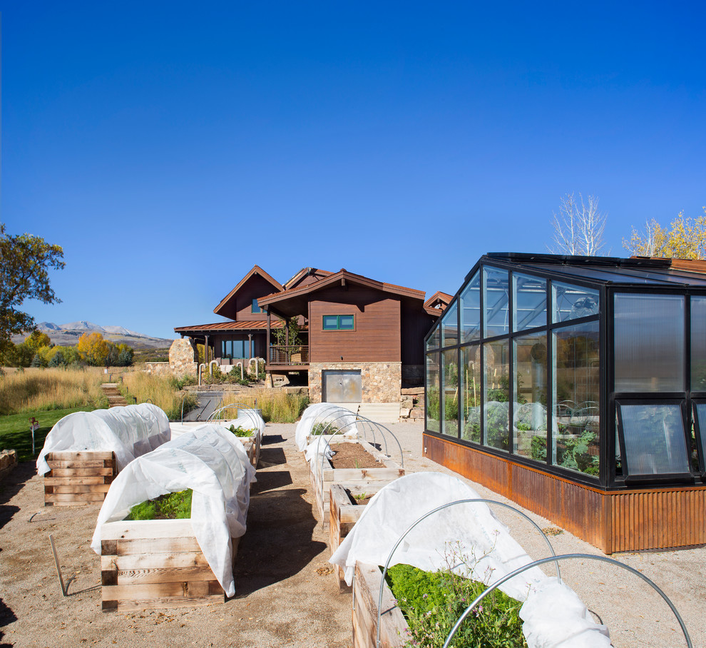 Photo of an expansive contemporary detached greenhouse in Denver.