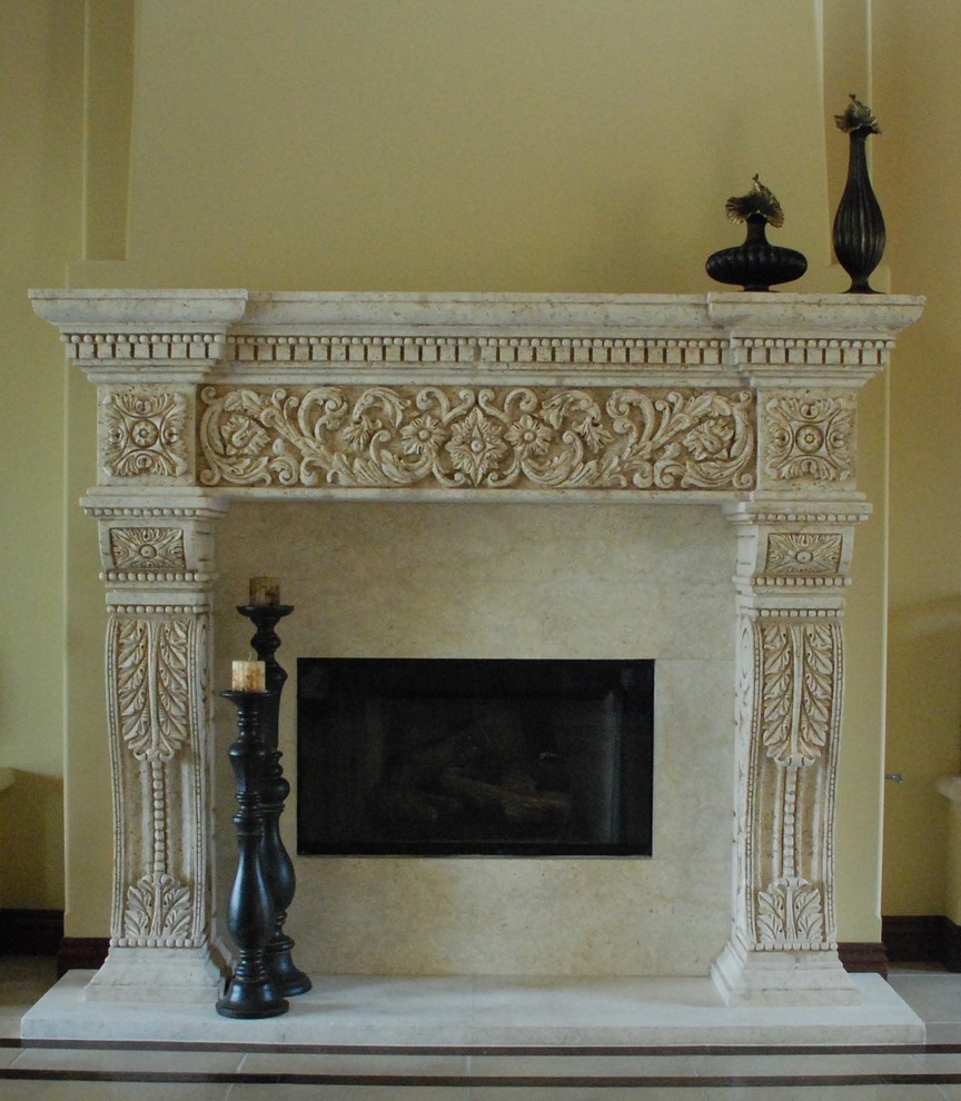 This is an example of a living room in Los Angeles with a stone fireplace surround.