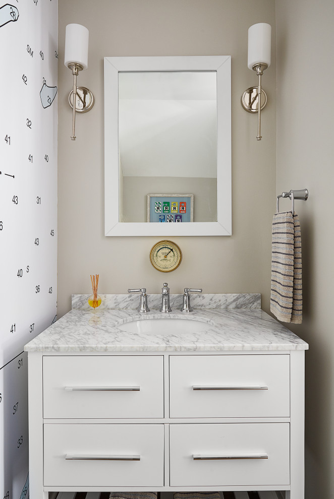 Small beach style wallpaper powder room photo in Other with white cabinets and a freestanding vanity