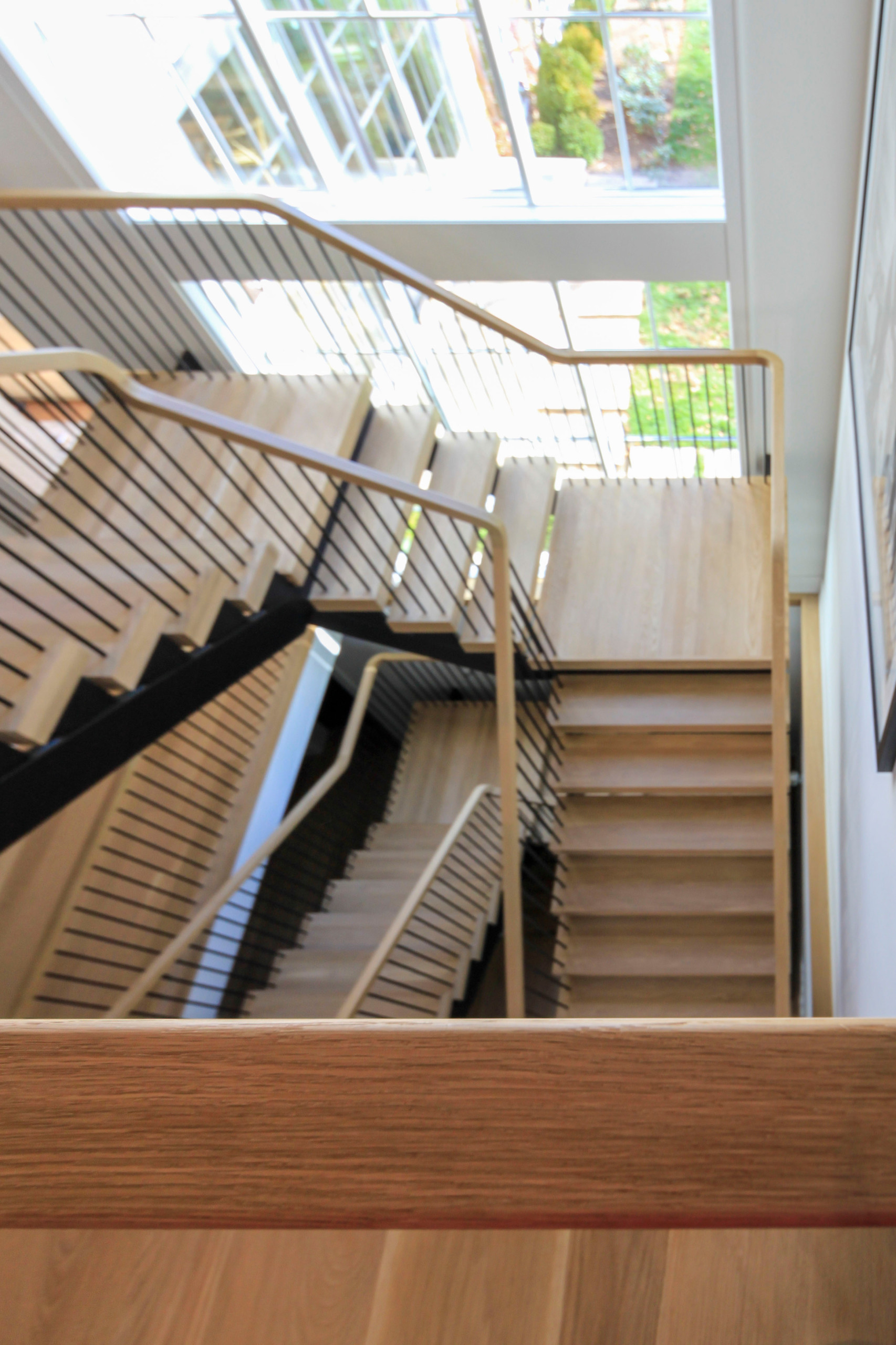 96_Dramatic cantilevered no-riser staircase, Bethesda, MD 20814