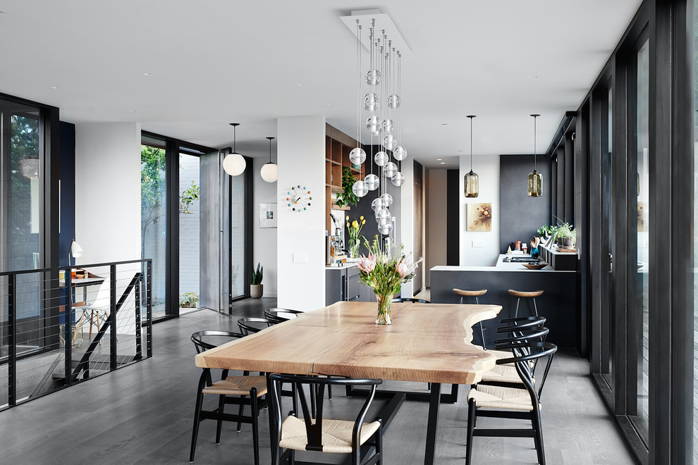 Great room - 1960s gray floor great room idea in San Francisco with white walls