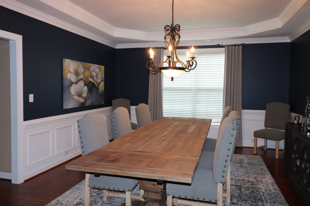 This is an example of a mid-sized transitional dining room in Raleigh.