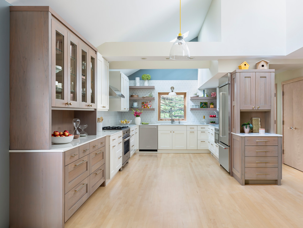 Design ideas for a mid-sized scandinavian u-shaped kitchen in Minneapolis with a double-bowl sink, flat-panel cabinets, white cabinets, white splashback, ceramic splashback, stainless steel appliances, light hardwood floors, no island, yellow floor and white benchtop.