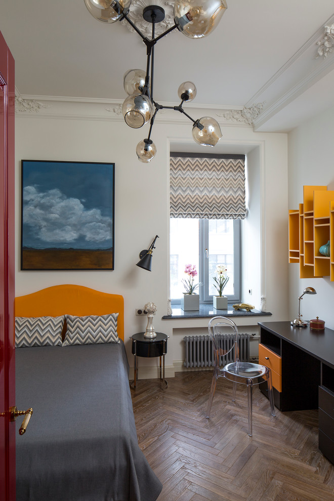 Inspiration for a mid-sized transitional kids' room for girls in Milan with white walls and medium hardwood floors.