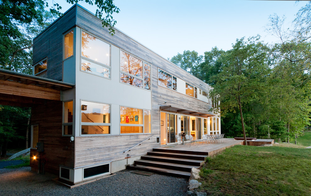 This is an example of a modern exterior in New York with wood siding.