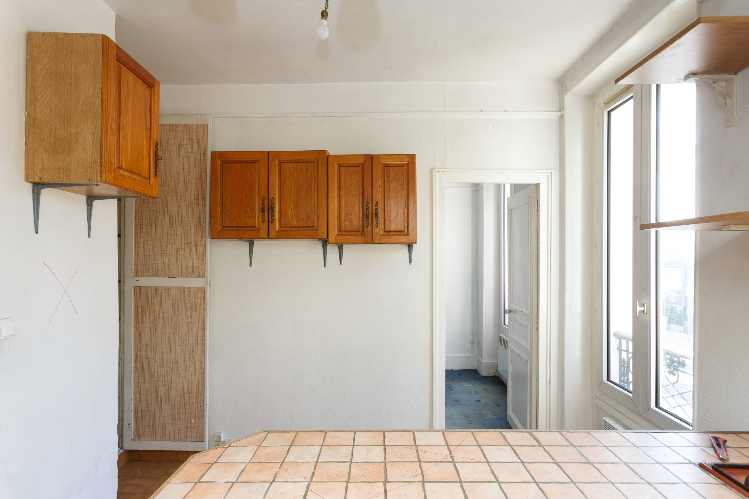Transformation d'un 40m² avec une cuisine ouverte sur le salon