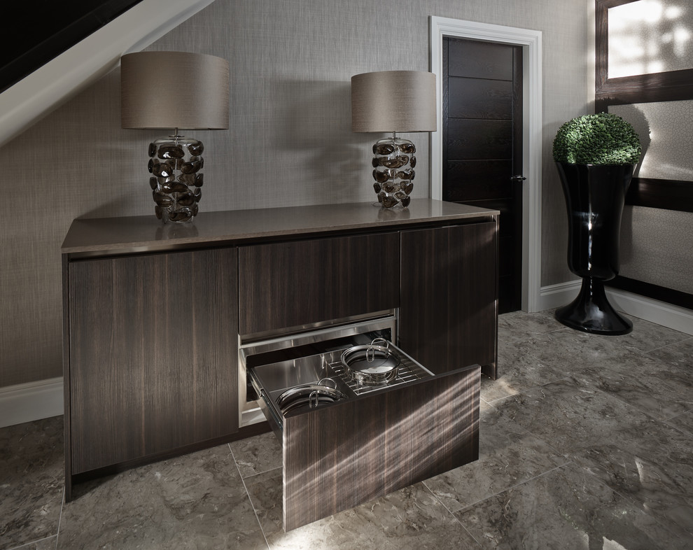 Design ideas for a medium sized contemporary enclosed kitchen with a built-in sink, flat-panel cabinets, brown cabinets, granite worktops, brown splashback, mirror splashback, black appliances, porcelain flooring, an island and brown floors.