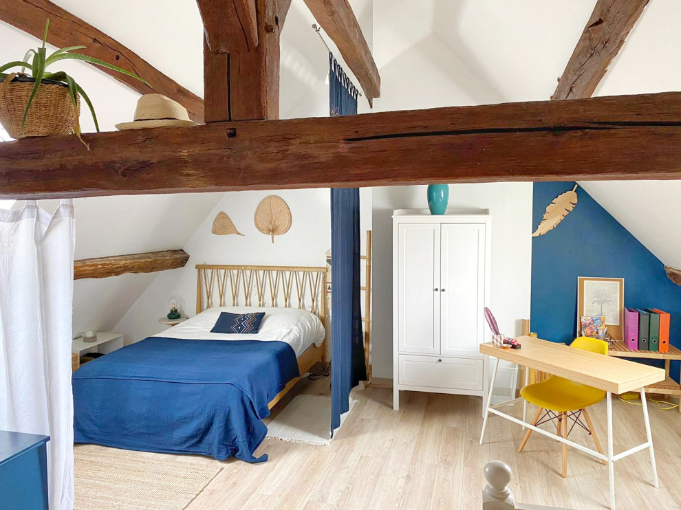 This is an example of a medium sized bohemian master bedroom in Other with multi-coloured walls, laminate floors, brown floors and exposed beams.