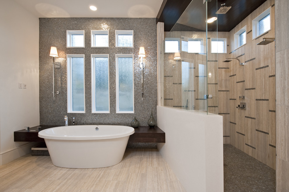 Inspiration for a contemporary bathroom in Austin with a double shower, a freestanding tub and mosaic tile.