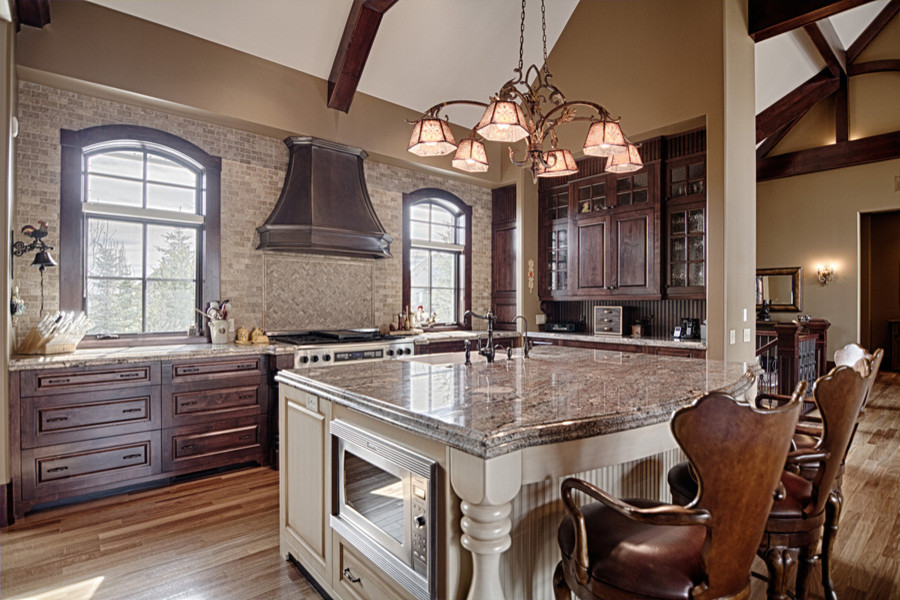 Example of a transitional kitchen design in Calgary