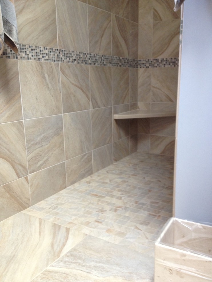 Mid-sized transitional marble tile alcove shower photo