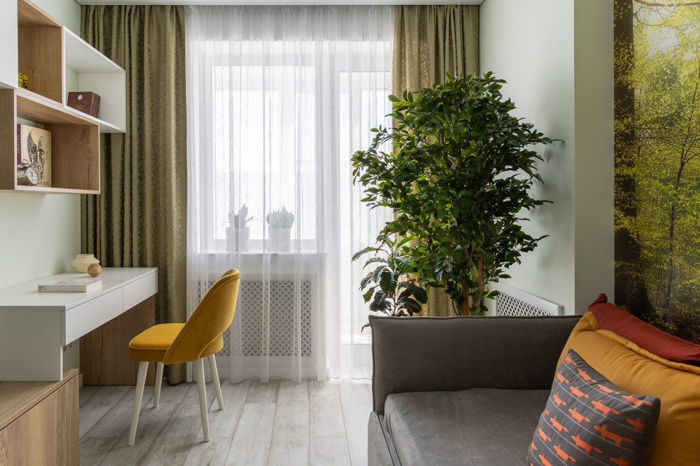Foto di una camera degli ospiti design di medie dimensioni con pareti bianche, pavimento in vinile, pavimento grigio e angolo studio