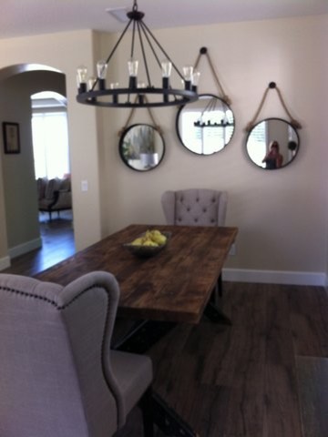 Kitchen - mid-sized transitional single-wall kitchen idea in Phoenix with an island