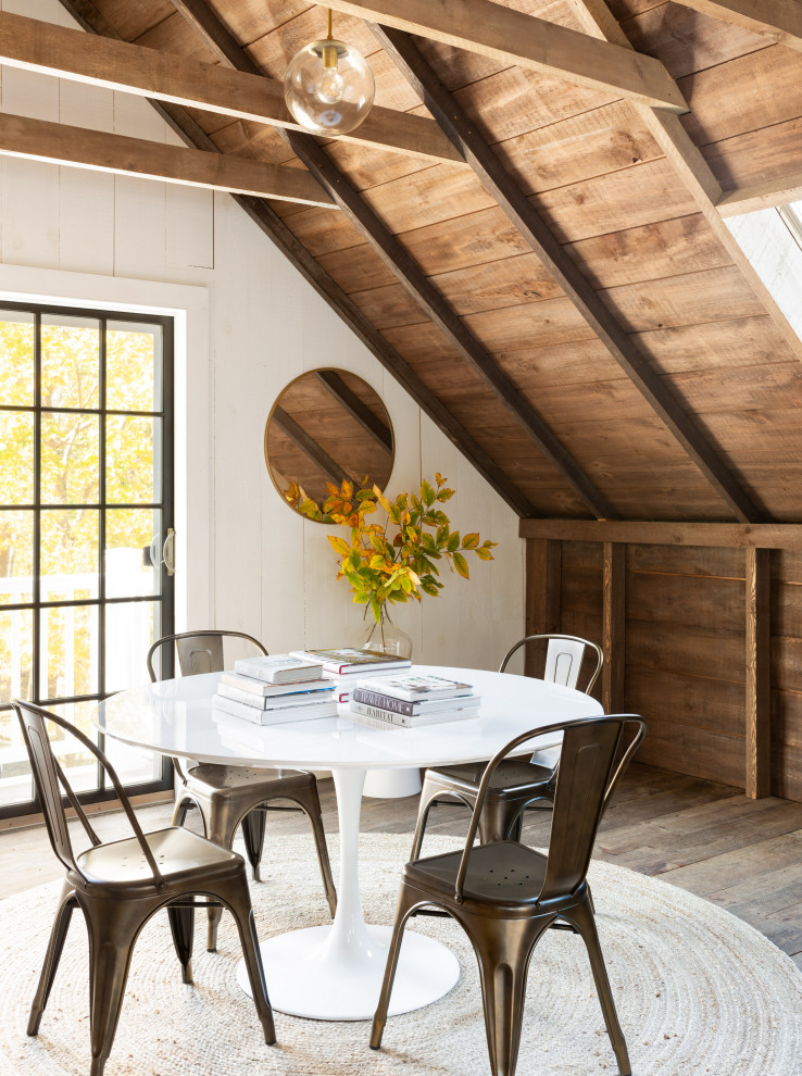 Study room - large farmhouse freestanding desk light wood floor and brown floor study room idea in Boston with white walls
