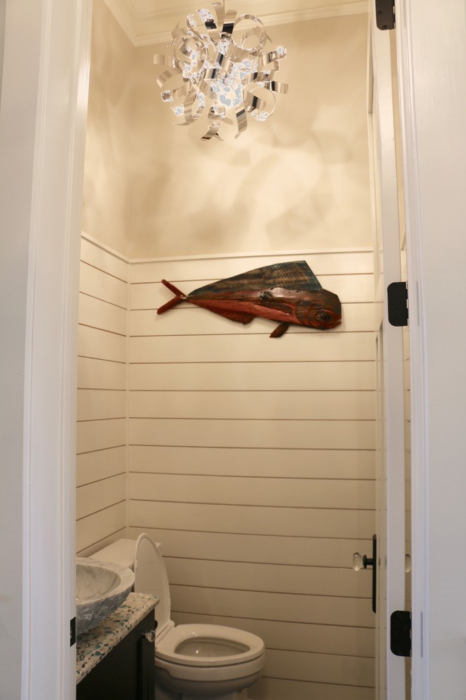 This is an example of a mid-sized beach style 3/4 bathroom in Other with flat-panel cabinets, dark wood cabinets, white walls, dark hardwood floors, a vessel sink and recycled glass benchtops.