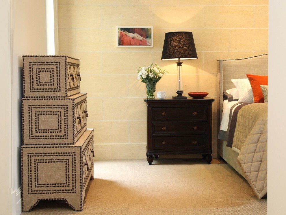 Inspiration for a large mediterranean master bedroom in Melbourne with beige walls and carpet.