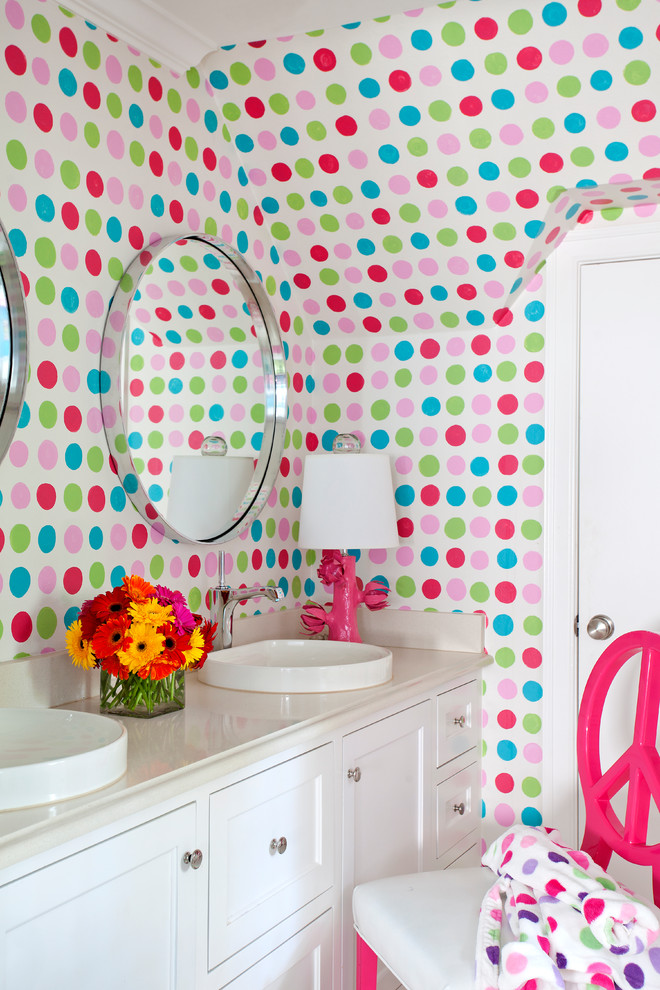 This is an example of a transitional kids bathroom in Little Rock with multi-coloured walls, a vessel sink, shaker cabinets and white cabinets.