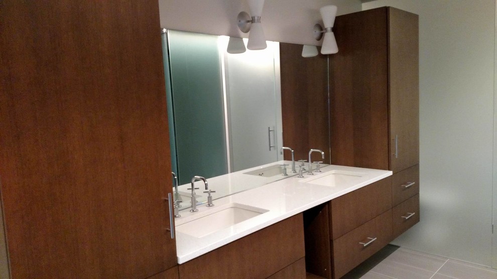 Midcentury bathroom in Boston with an undermount sink, flat-panel cabinets, dark wood cabinets, engineered quartz benchtops, a freestanding tub, an open shower, gray tile, ceramic tile, white walls and ceramic floors.