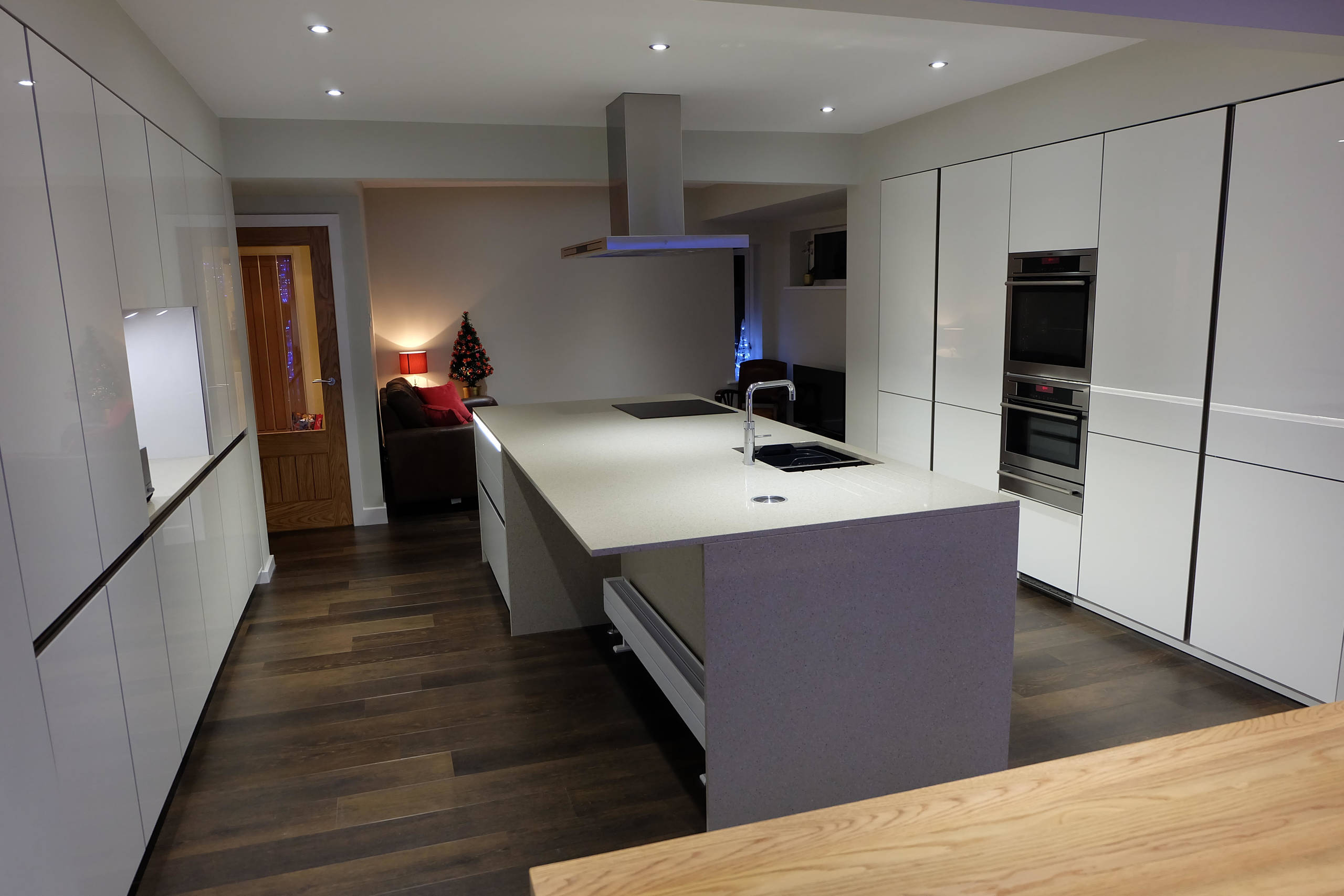 White Gloss Handleless Keller Kitchen with Brescia Stone Work Surfaces