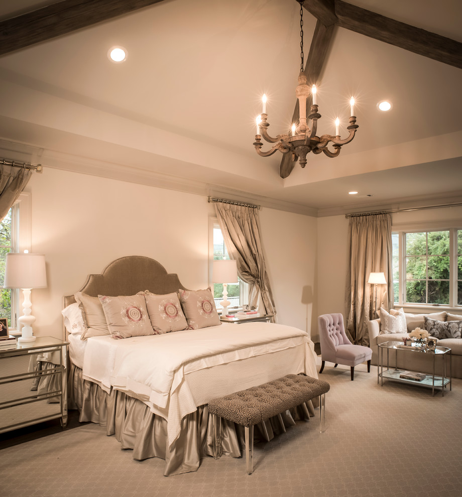 Photo of a traditional bedroom in Houston with white walls.