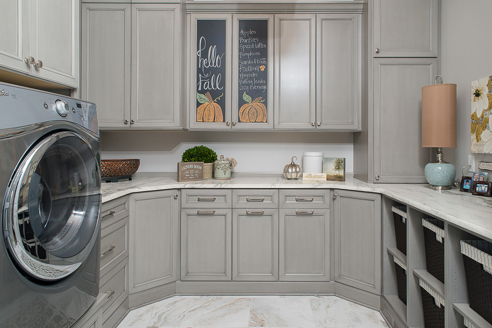 Traditional dedicated laundry room in Other with recessed-panel cabinets and grey cabinets.