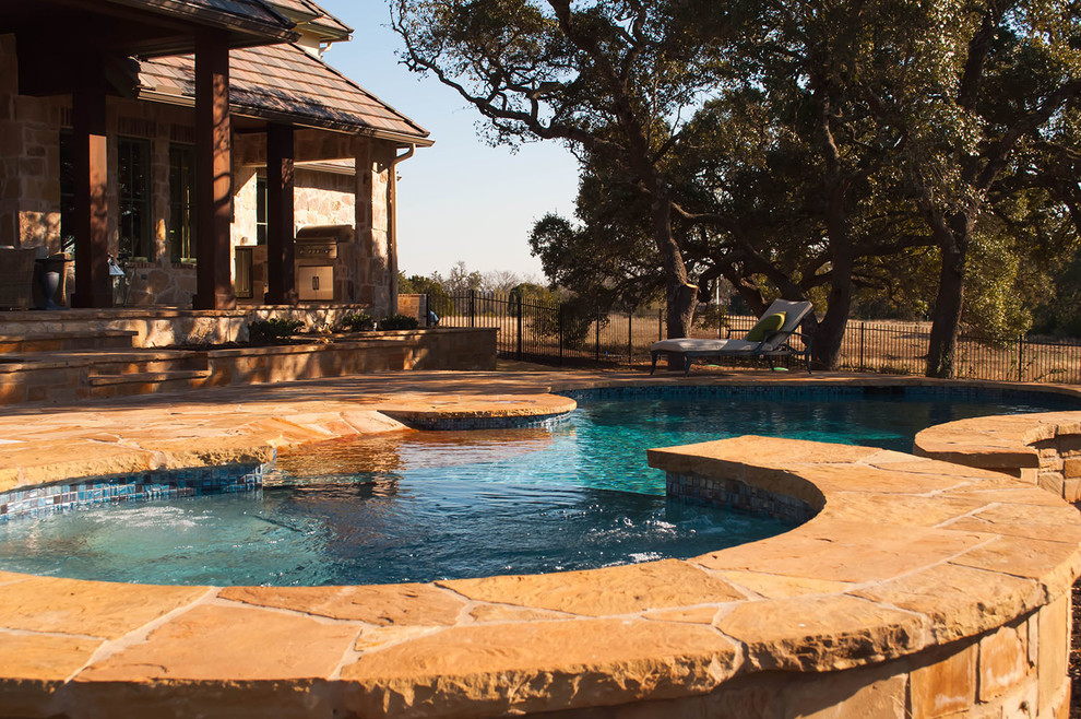 Mountain style pool photo in Austin