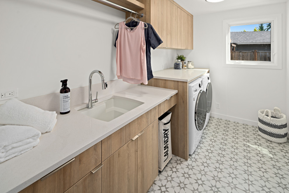 This is an example of a midcentury laundry room in Seattle.