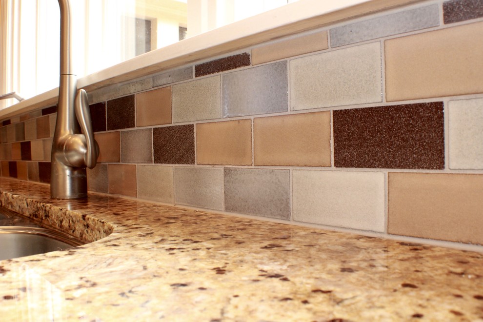 Home design - transitional single-wall home design idea in Cincinnati with granite countertops, multicolored backsplash and subway tile backsplash