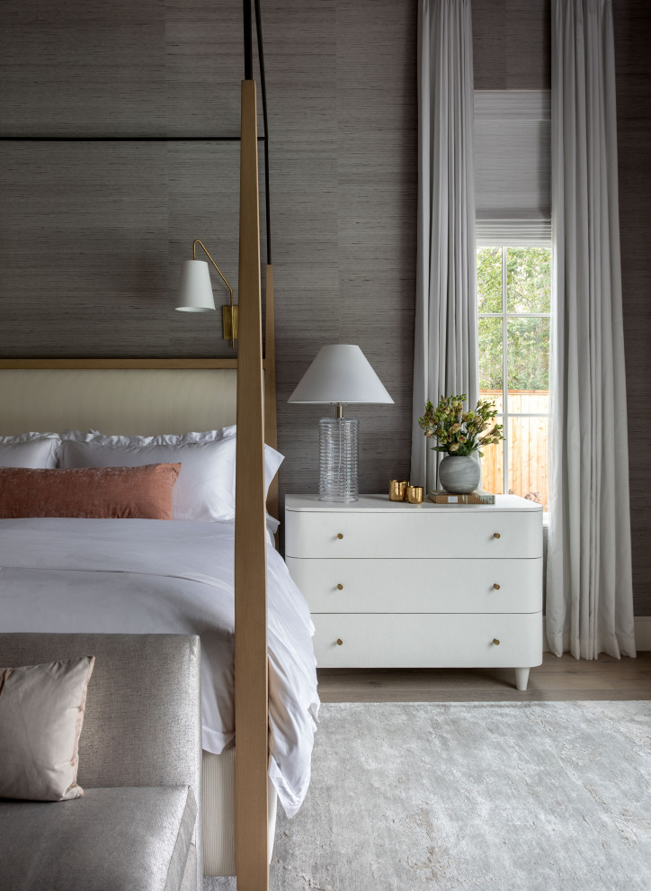 Design ideas for an expansive transitional master bedroom in Houston with grey walls, medium hardwood floors, brown floor, wallpaper and wallpaper.