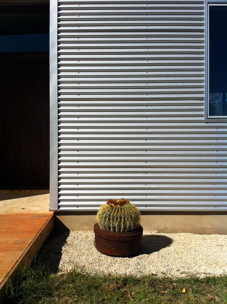 Inspiration for an industrial home design remodel in Austin
