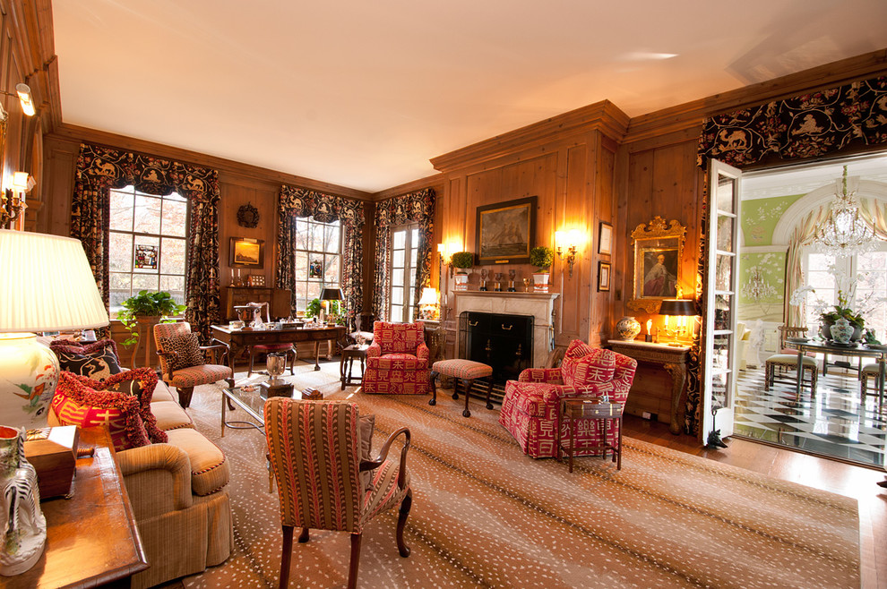 Traditional family room in Louisville with a library.