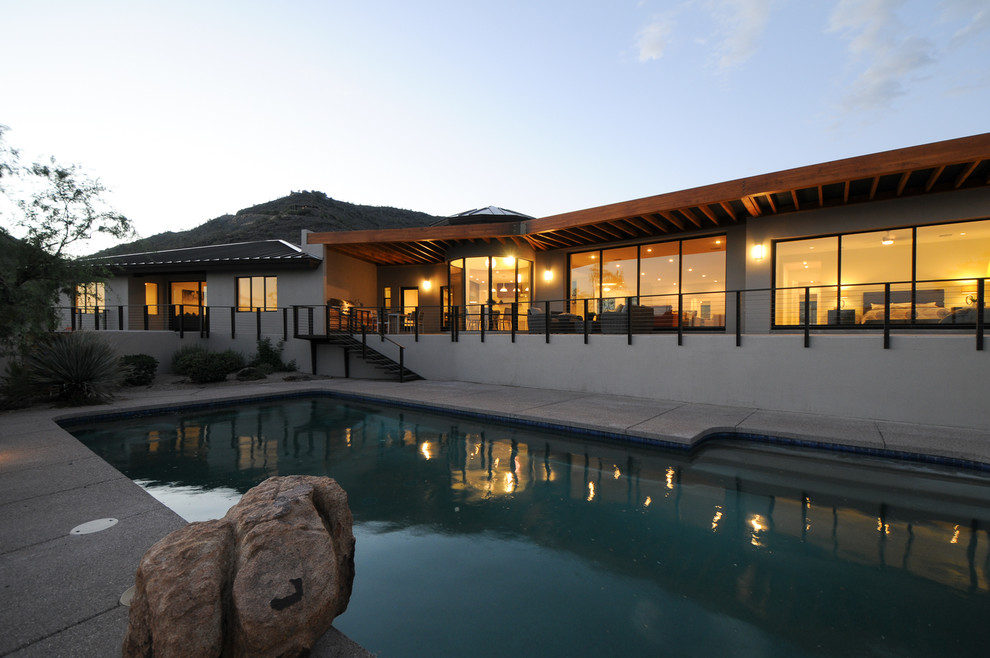 Transitional backyard rectangular natural pool fountain photo in Phoenix