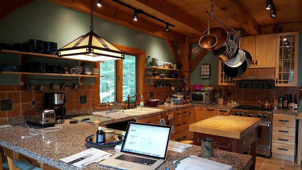 Inspiration for a mid-sized rustic u-shaped terra-cotta tile and beige floor eat-in kitchen remodel with a double-bowl sink, shaker cabinets, light wood cabinets, tile countertops, red backsplash, ceramic backsplash, stainless steel appliances, a peninsula and multicolored countertops