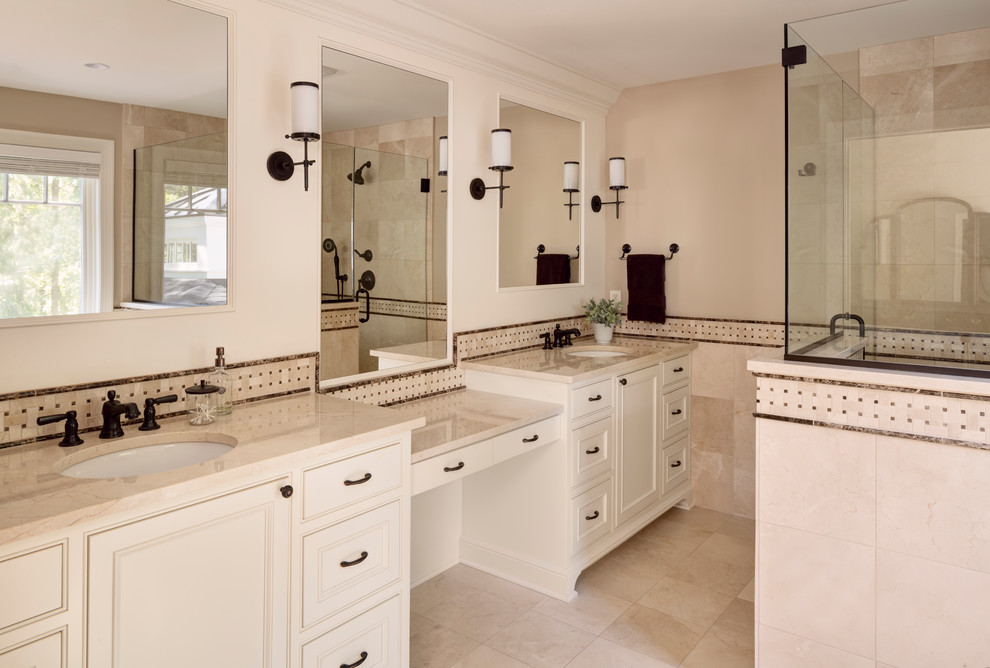 Example of a large farmhouse master beige tile, brown tile and limestone tile ceramic tile and beige floor corner shower design in Milwaukee with recessed-panel cabinets, white cabinets, beige walls, an undermount sink, laminate countertops and a hinged shower door