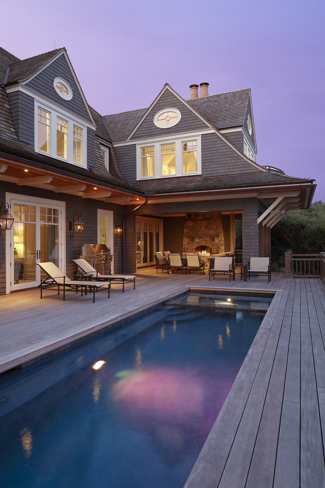 Beach style pool in Charleston with decking.