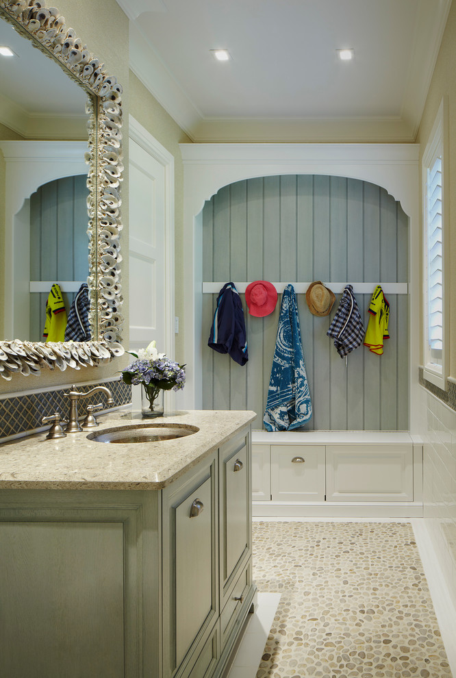Photo of a mid-sized beach style kids bathroom in Miami with multi-coloured tile and granite benchtops.