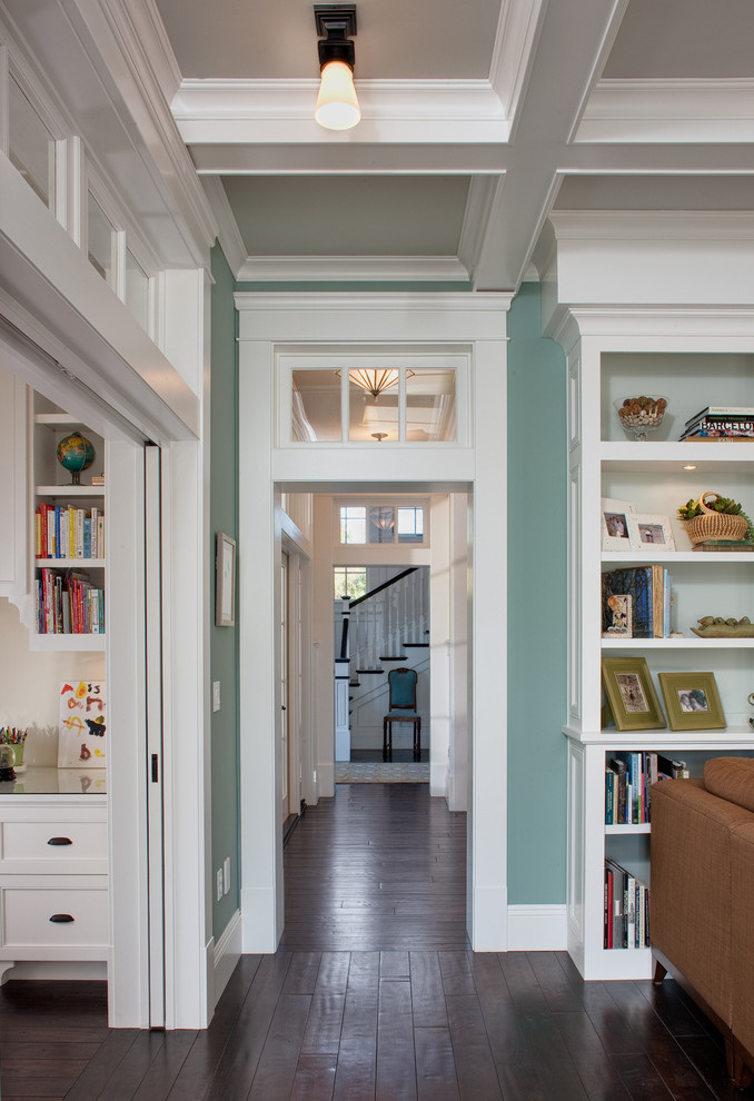 West Coast Hamptons - Example of a classic dark wood floor hallway design in San Diego with blue walls
